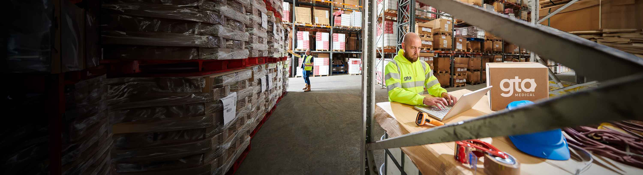 Person in warehouse filled with GTA medical products